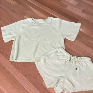 Aerie lime green shirt size medium and shorts size extra small.